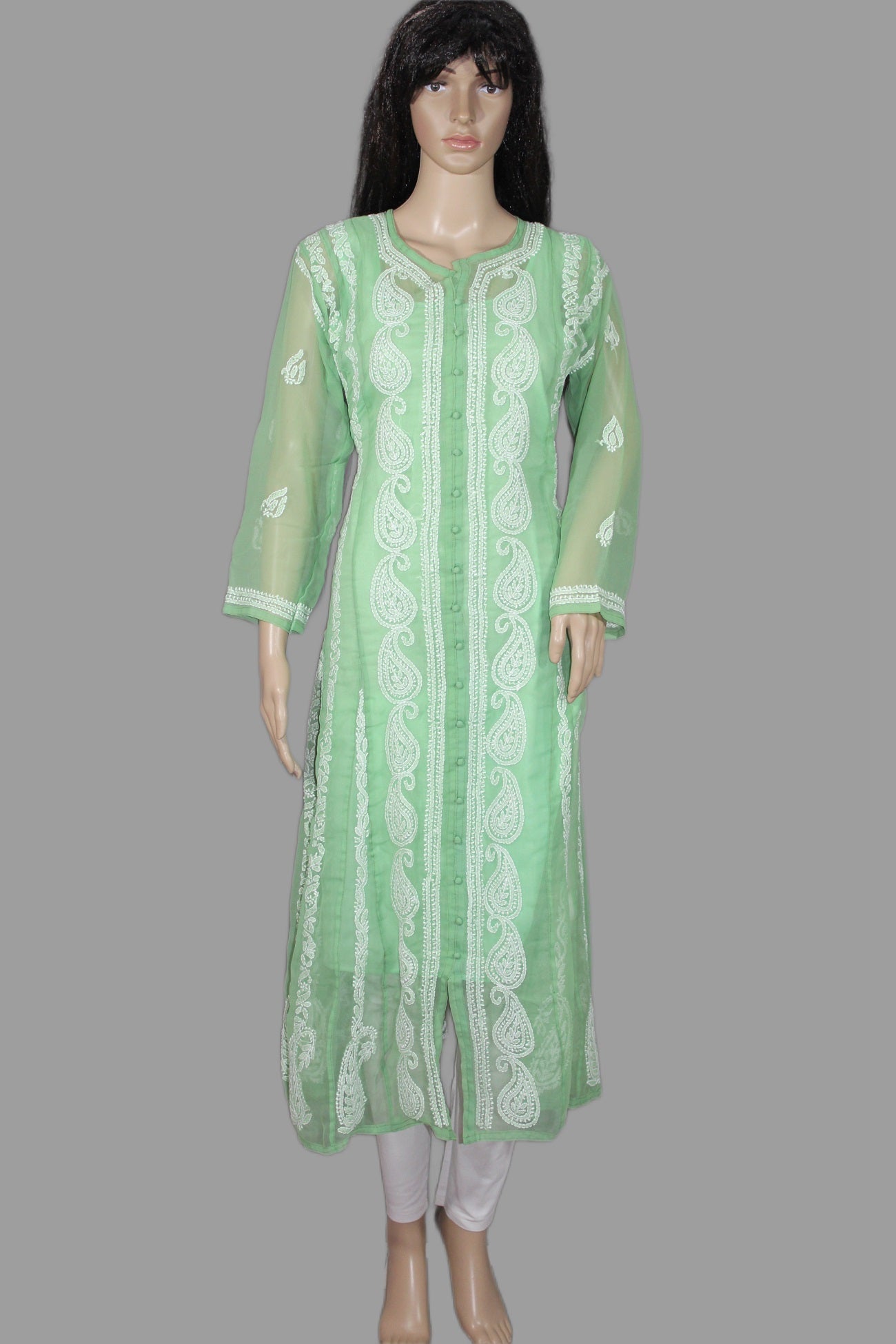 Green embroidered kurta on a mannequin against a gray background