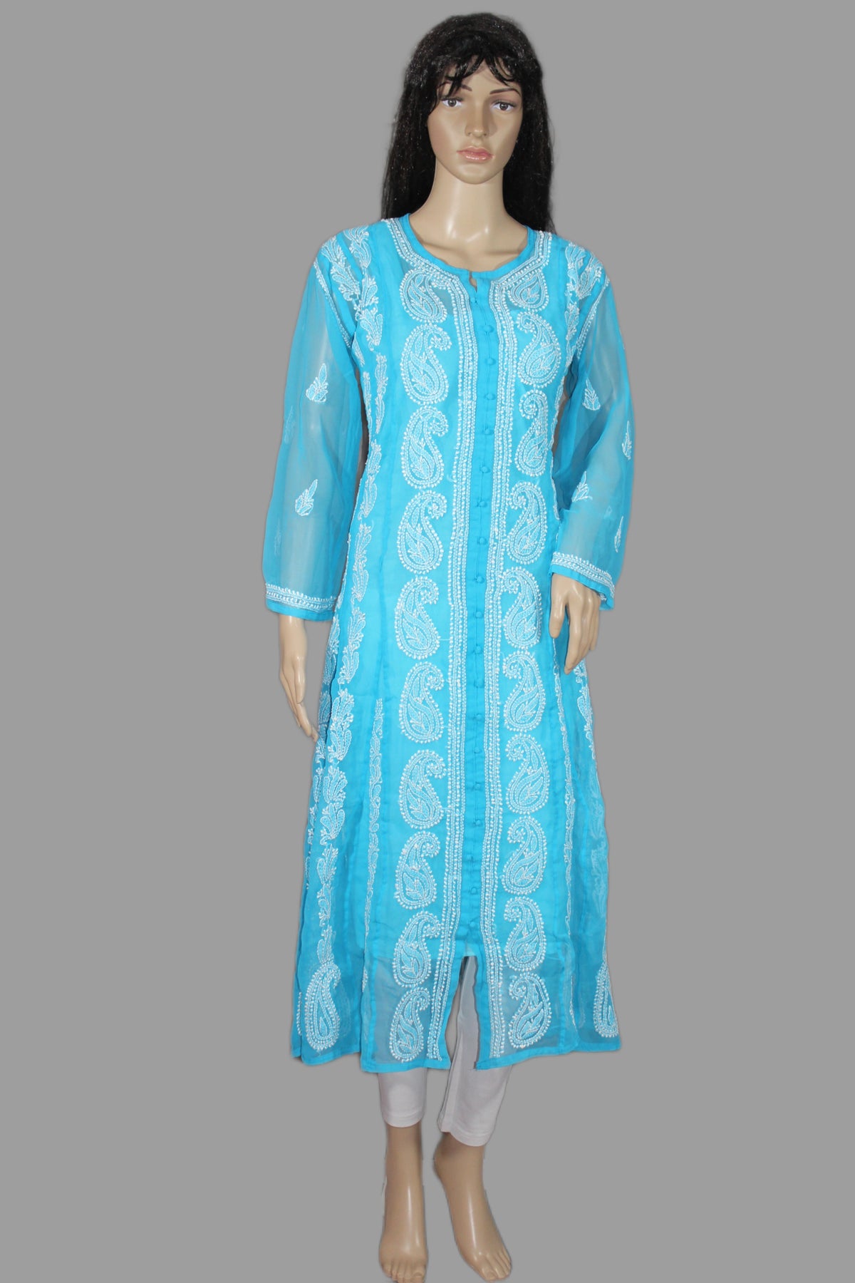 A light blue kurta with white paisley embroidery, displayed on a female mannequin against a solid gray background.