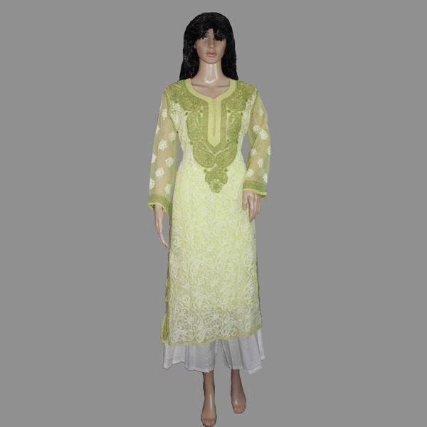 Green embroidered dress on a mannequin against a gray background