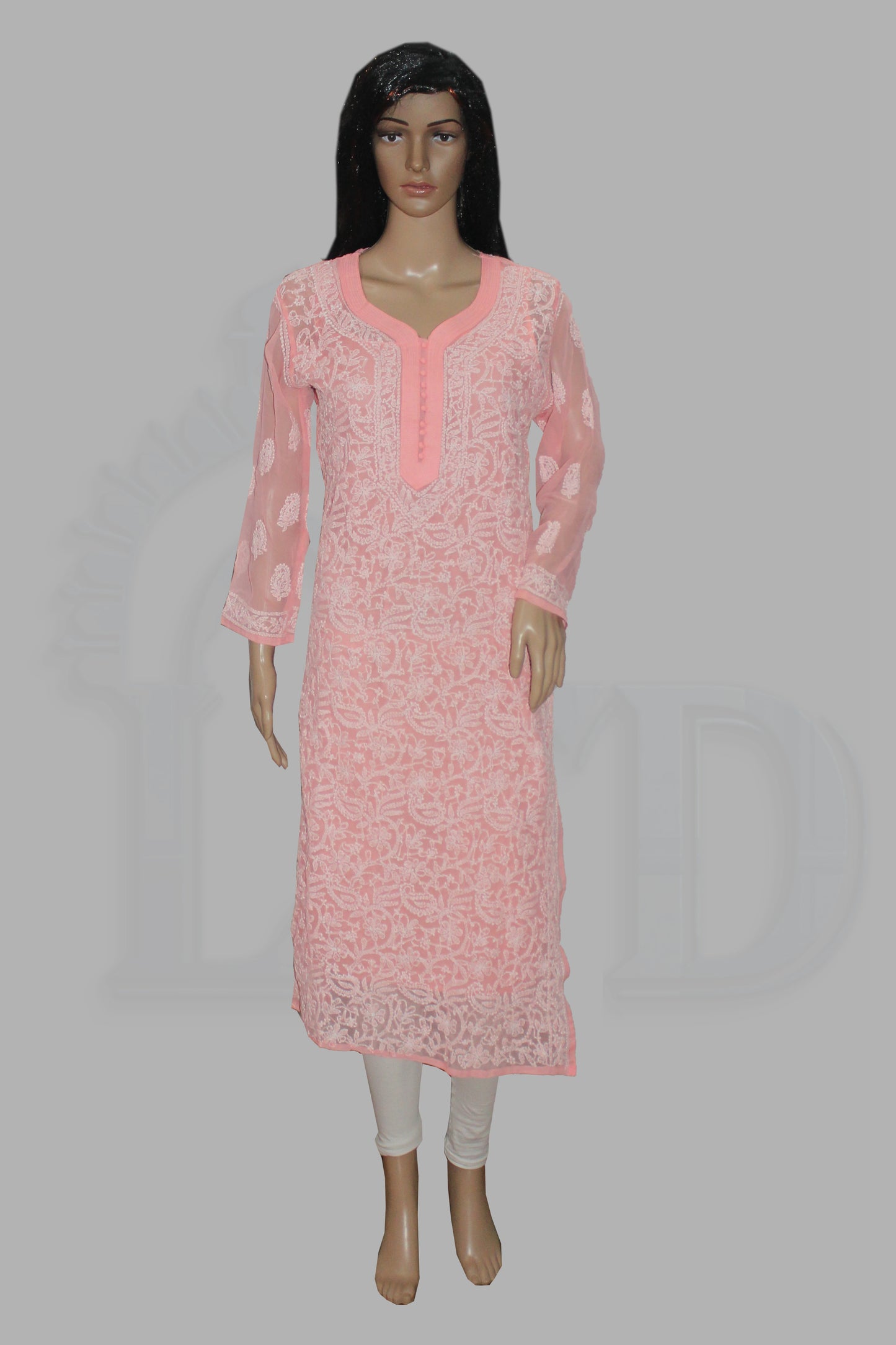 Mannequin wearing a pink lace dress on a gray background