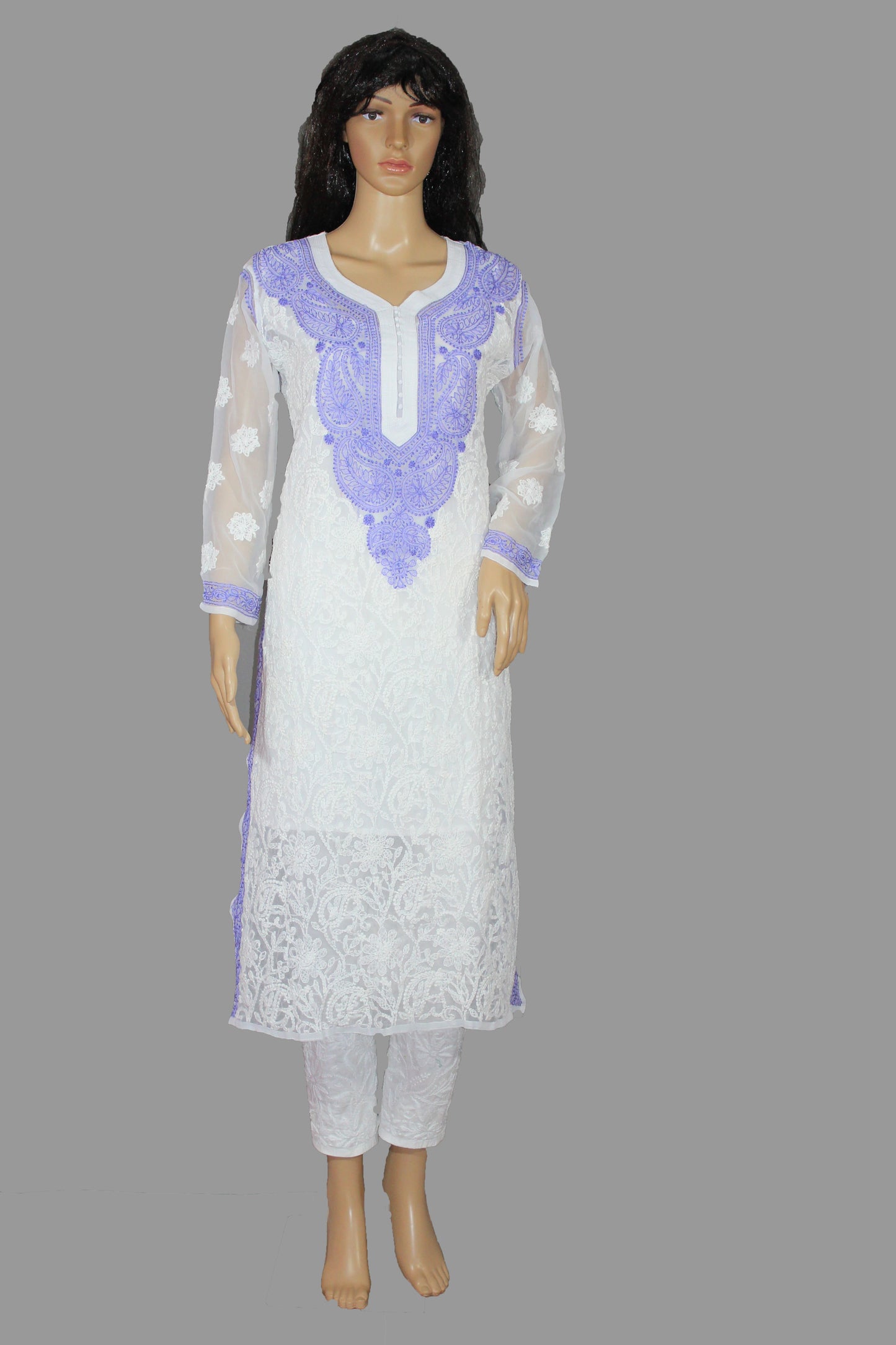 White kurta with purple embroidery on a mannequin against a gray background