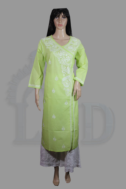 Light green kurta with white embroidery on a mannequin against a gray background