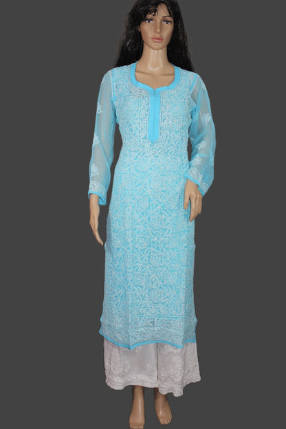 Light blue embroidered dress on a mannequin against a gray background
