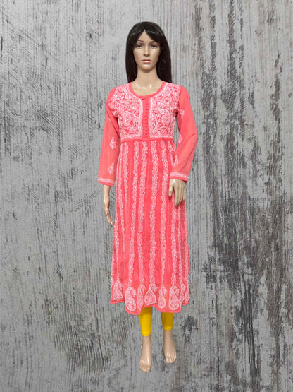 Mannequin wearing a pink embroidered kurta against a textured gray background