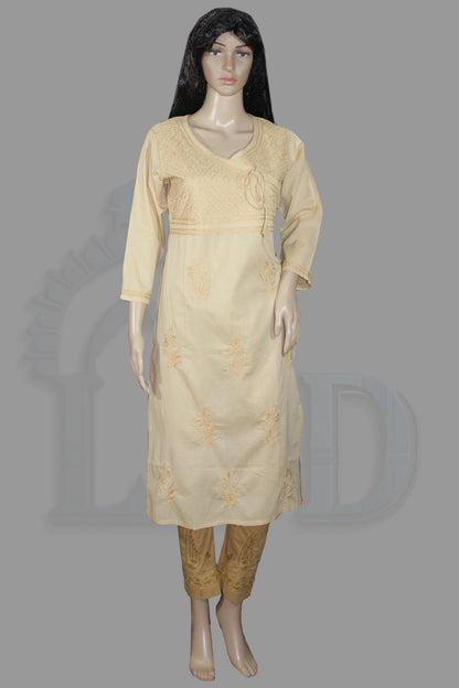 Lucknowi chikankari A cream-colored three-piece Indian ethnic wear set consisting of a long-sleeve kurta, pants, and a dupatta, displayed on a female mannequin against a solid gray background.