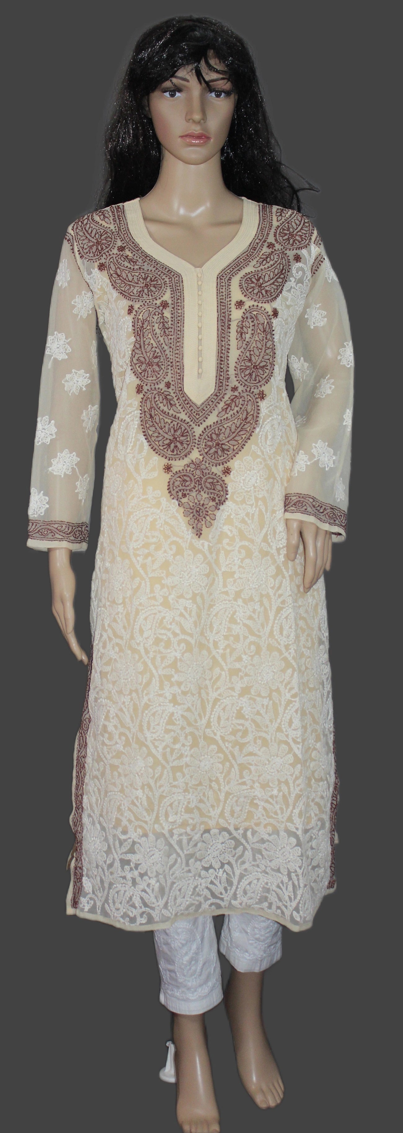 Mannequin wearing a cream-colored embroidered kurta with a plain background