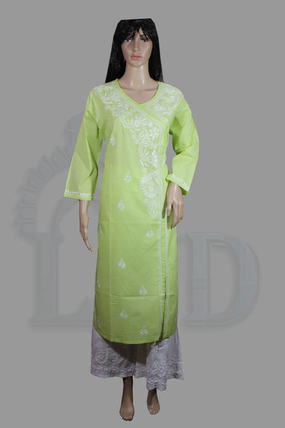Light green kurta with white embroidery on a mannequin against a gray background