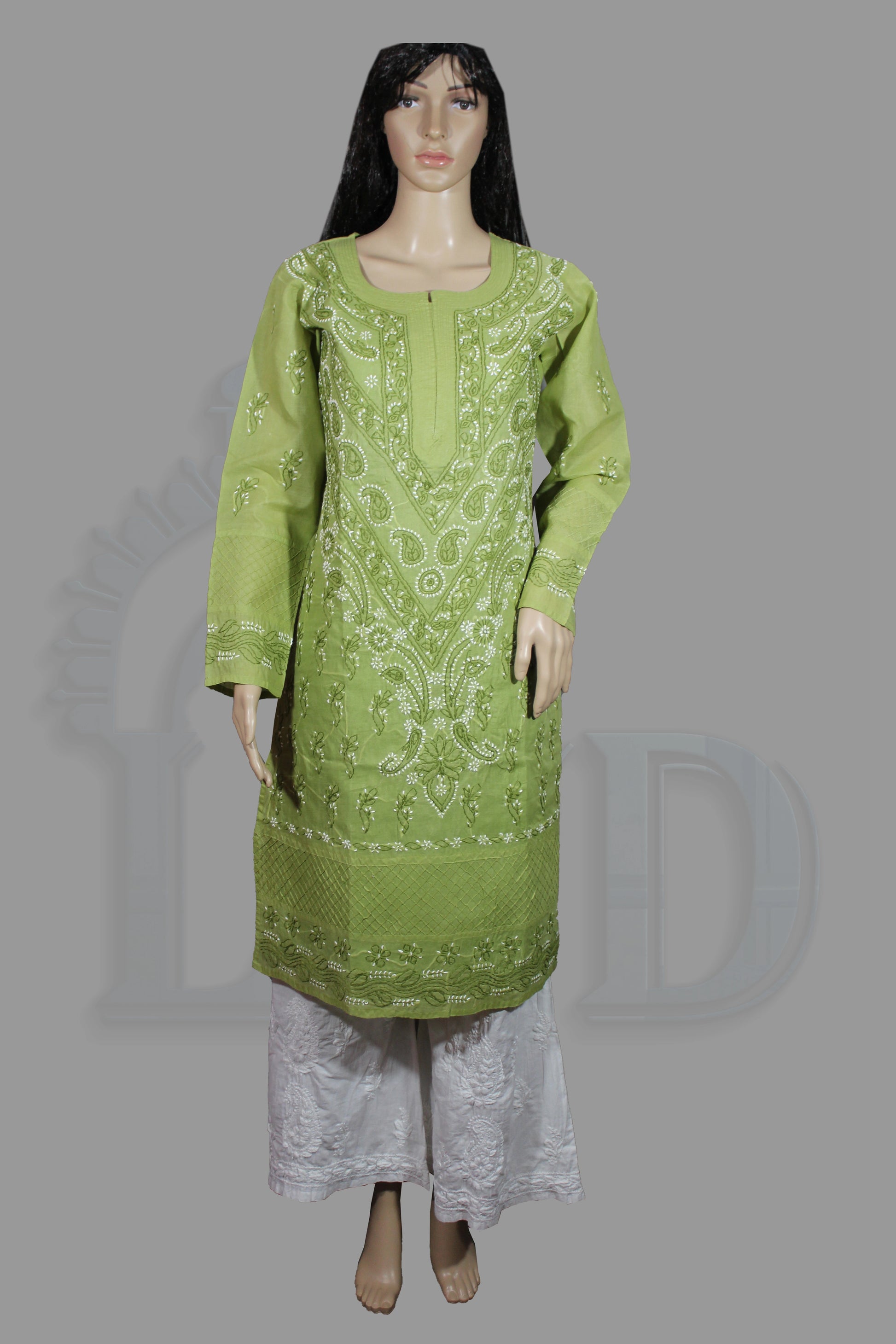 Green embroidered kurta on a mannequin against a gray background