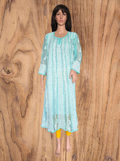 Green kurta with white floral embroidery on a beige background
