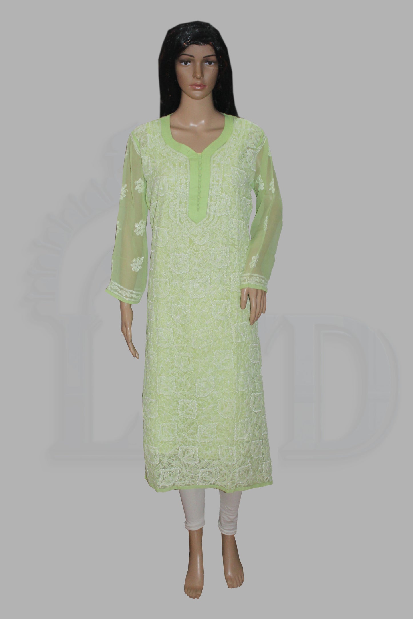 Light green embroidered kurta on a mannequin against a gray background