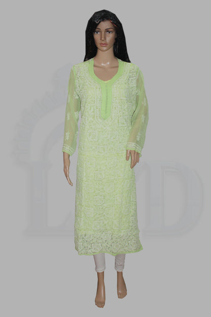 Light green lace dress on a mannequin against a gray background