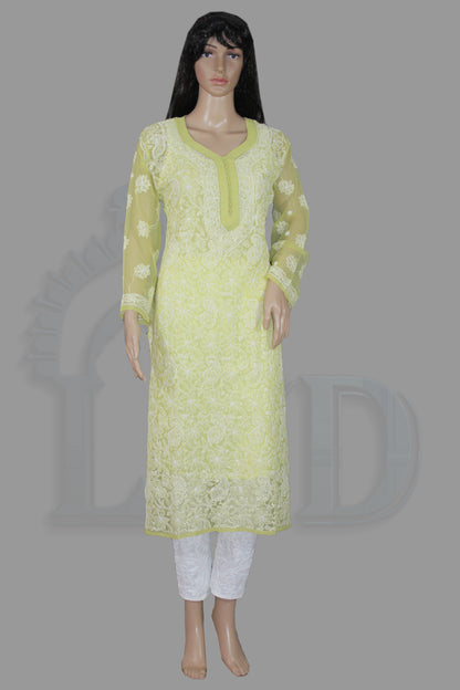 Light green embroidered kurta with white pants on a mannequin against a gray background