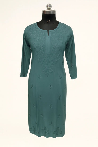 Lucknowi chikankari Teal dress on a mannequin against a white background