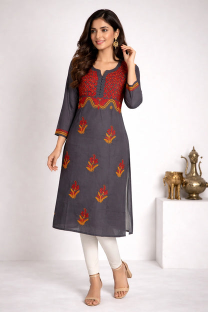 Woman wearing a chikank kadhai gray kurta with red and orange patterns on a white background