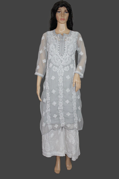 Gray embroidered traditional outfit on a mannequin against a gray background