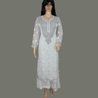 Mannequin wearing a light gray embroidered dress on a plain background