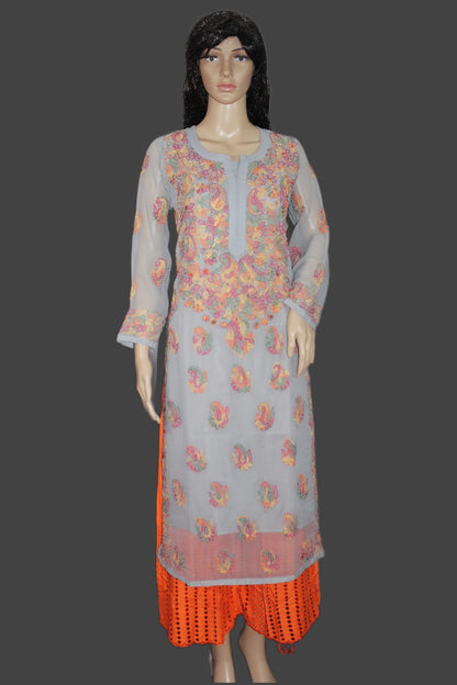Mannequin wearing a floral dress with a gray top and orange bottom on a dark background