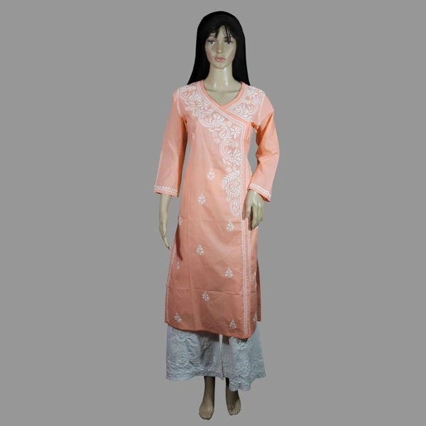 Peach-colored kurta with white embroidery on a gray background
