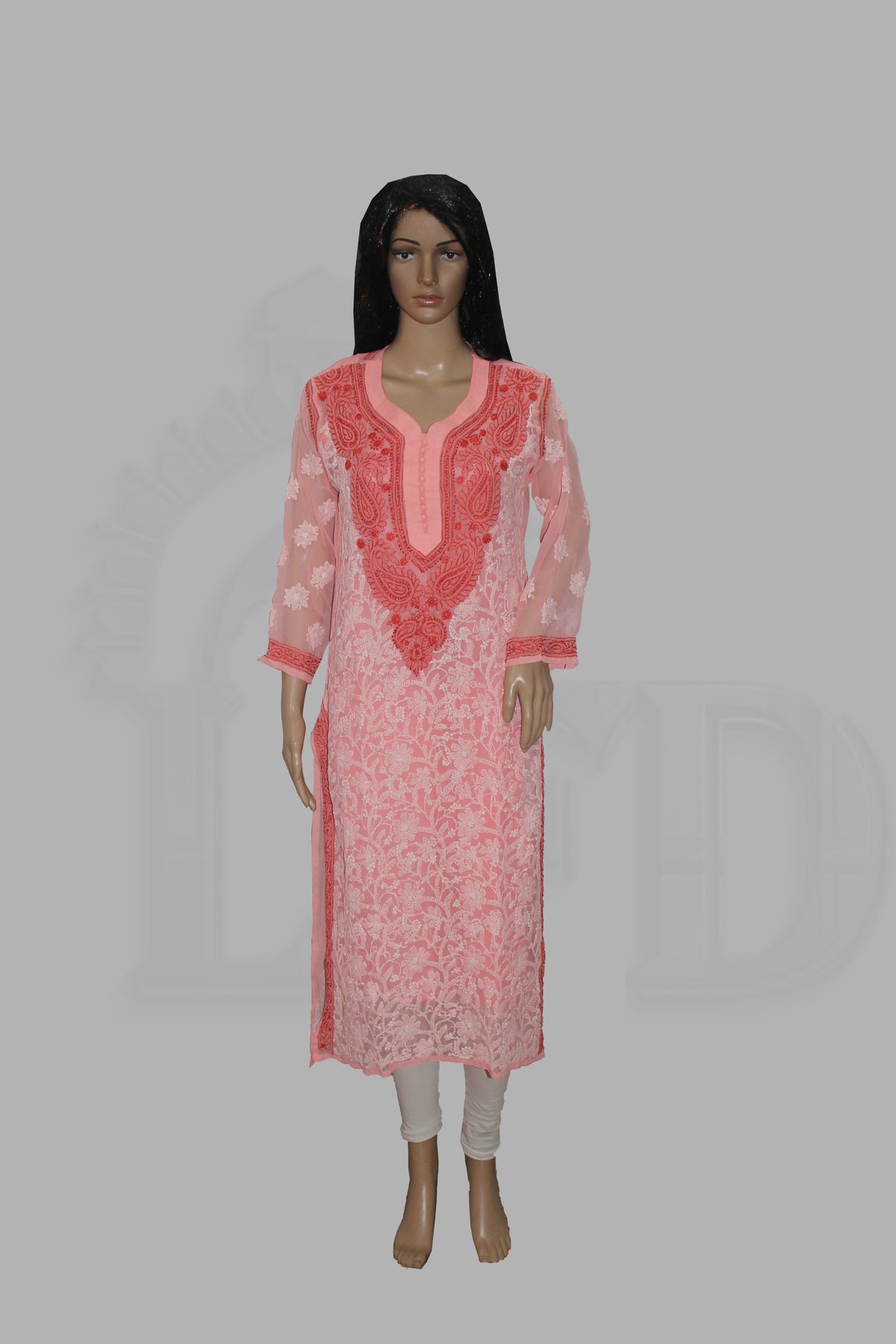 Mannequin wearing a pink kurta with white pants on a gray background