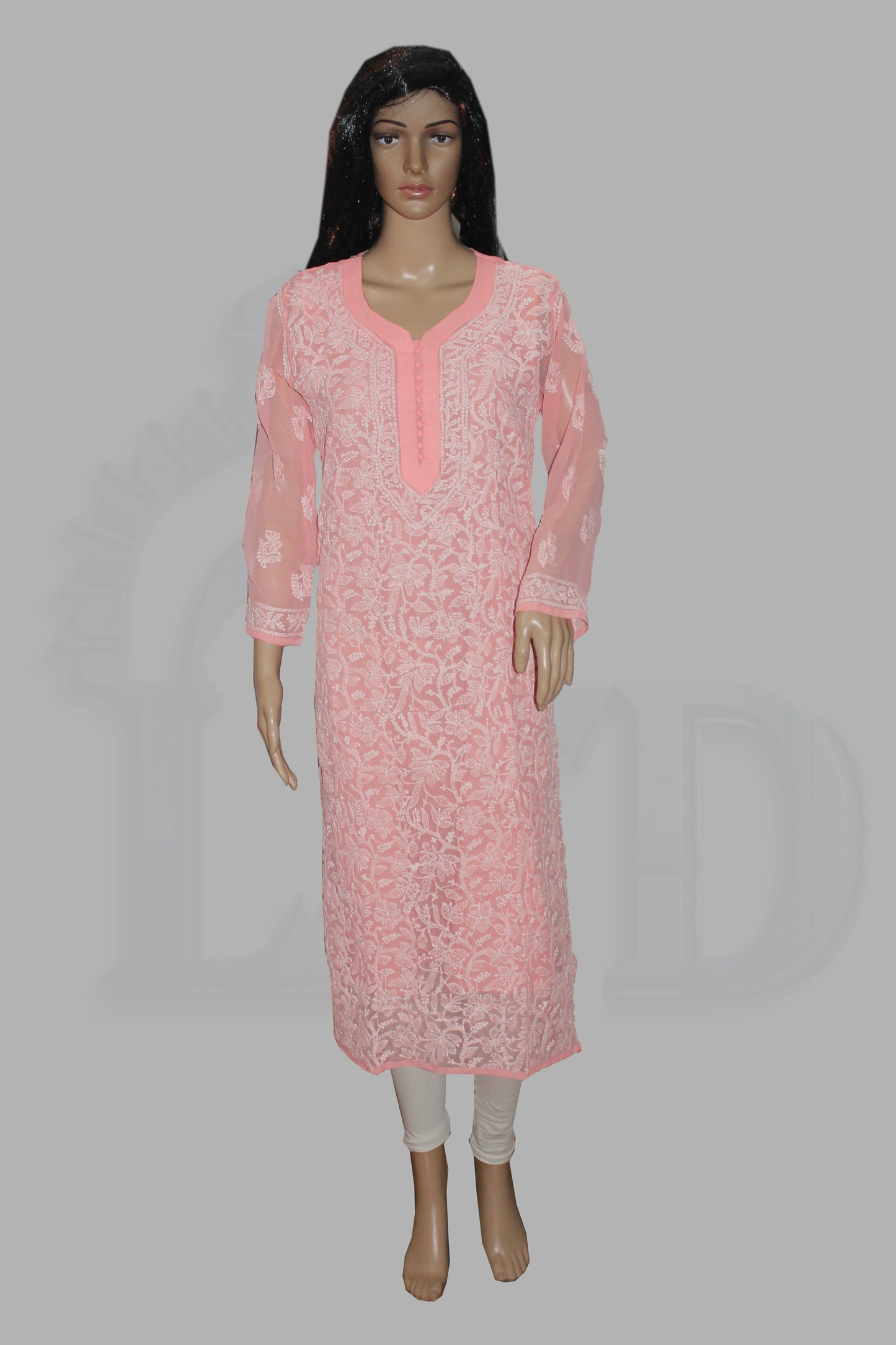 Mannequin wearing a pink kurta with white pants on a gray background