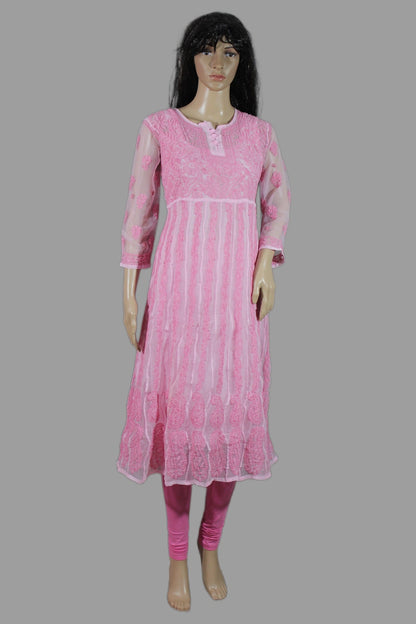 Mannequin wearing a lucknowi chikankari pink traditional outfit with a gray background