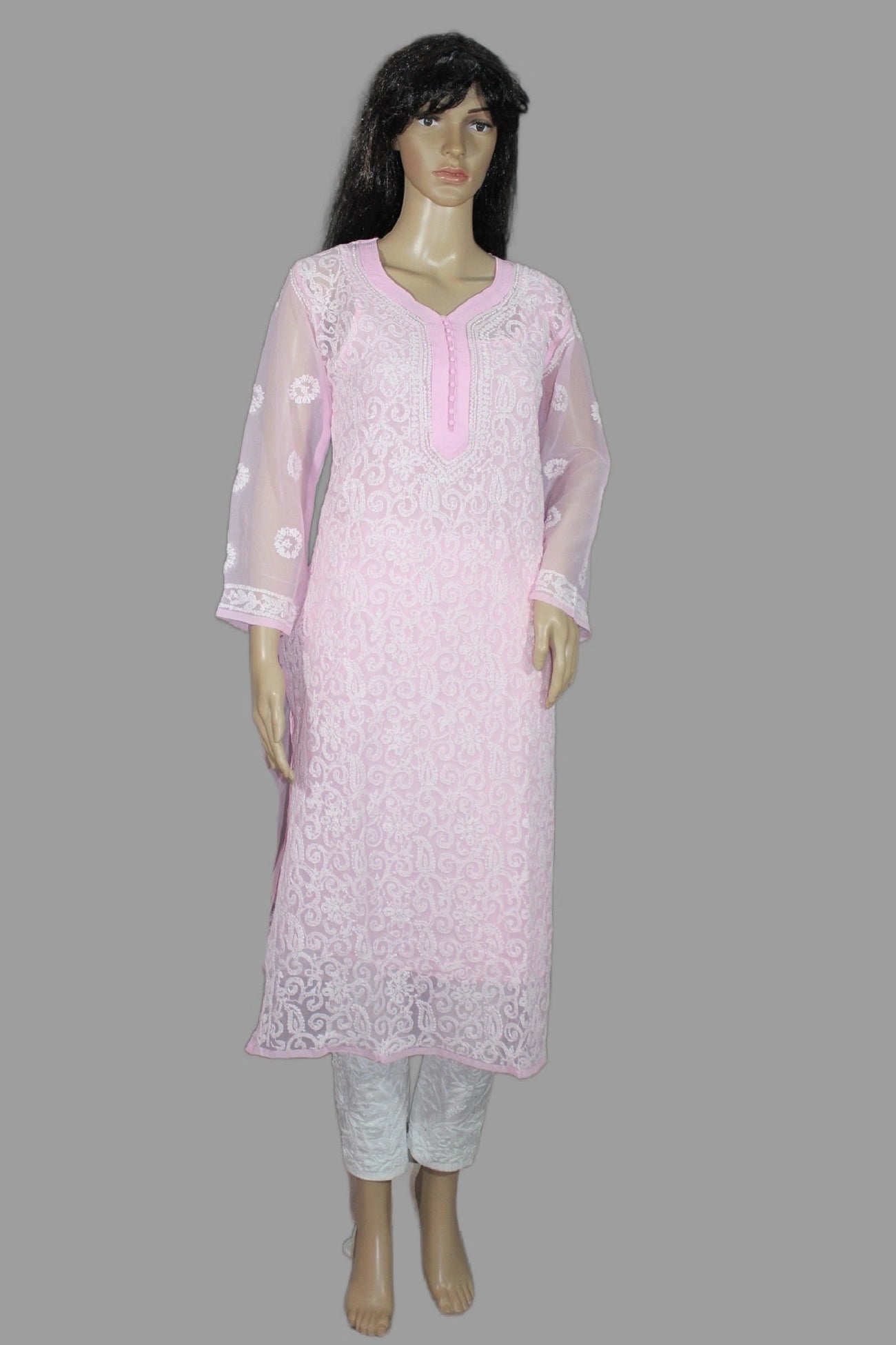 Mannequin wearing a light pink embroidered kurta with white pants on a gray background