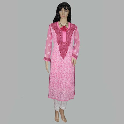 Mannequin wearing a pink embroidered traditional outfit on a gray background