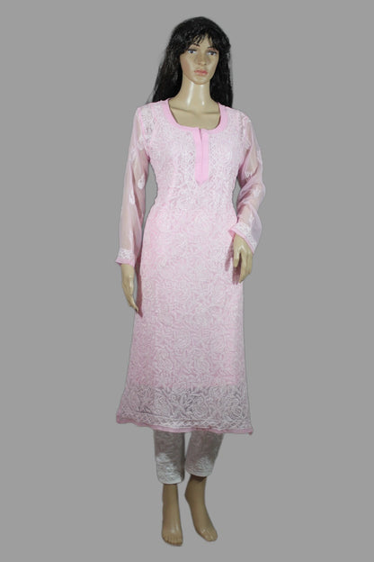 Mannequin wearing a pink lace outfit on a gray background
