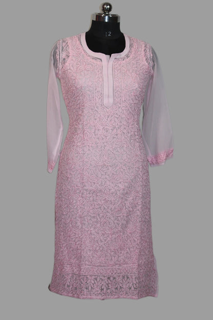 Pink embroidered kurta on a mannequin against a gray background