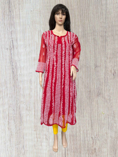 lucknowi chikankari Red and white patterned kurta on a mannequin against a wooden background