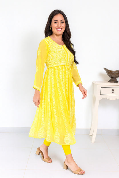 lucknowi chikankari Woman wearing a yellow dress with a white background