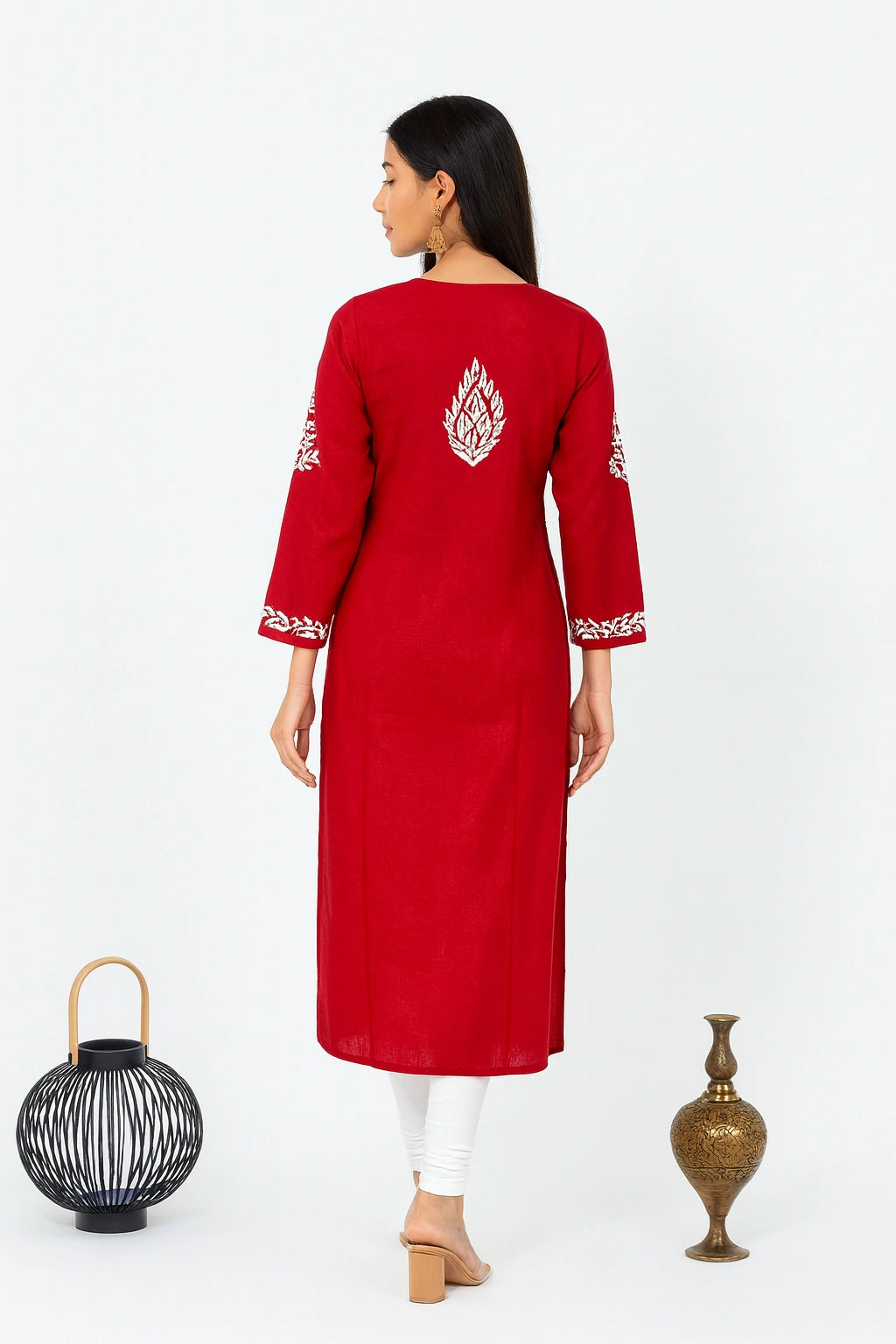 Woman wearing a pink kurta with white background