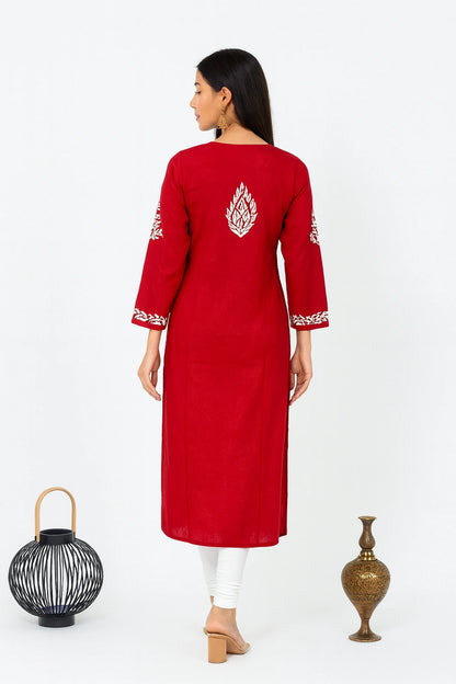 Woman wearing a pink kurta with white background