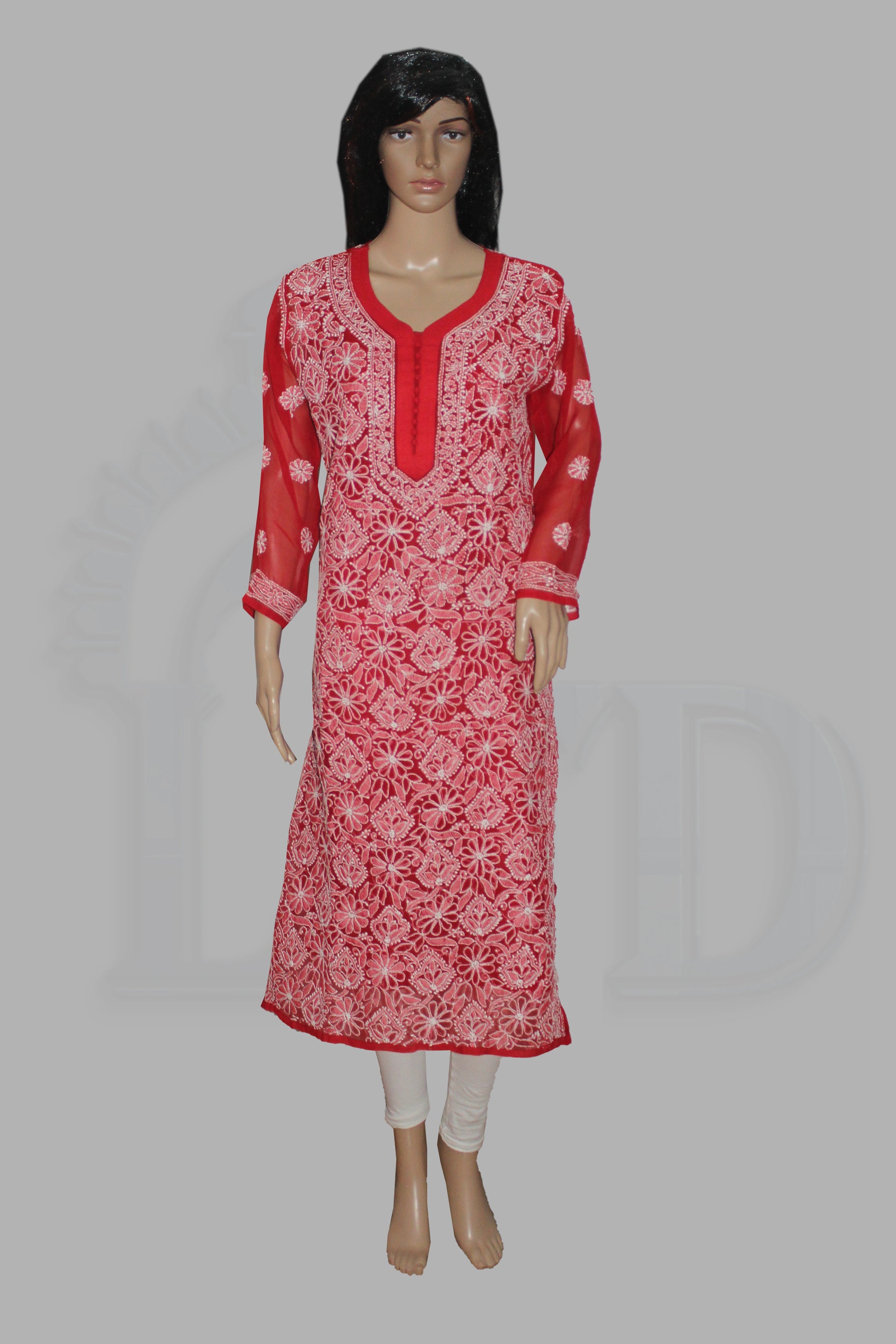 Red and white embroidered kurta on a mannequin against a gray background