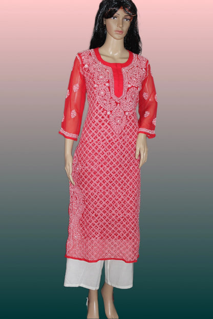 Red embroidered kurta with white pants on a gradient background