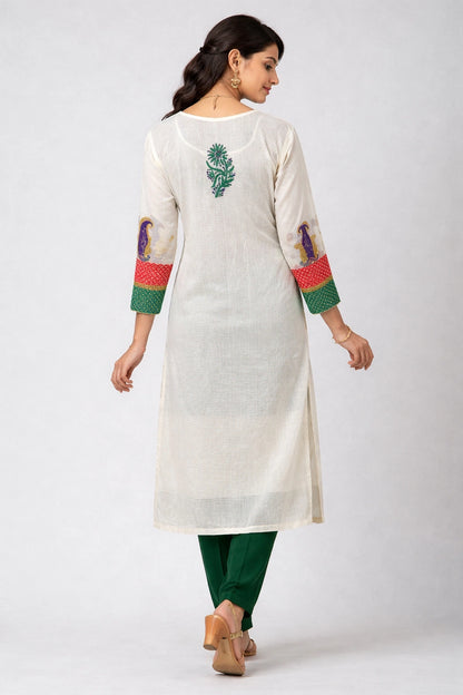 Lucknowi chikankari Woman wearing a white kurta with green and red details on a white background