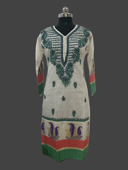 Embroidered dress on a mannequin against a gray background
