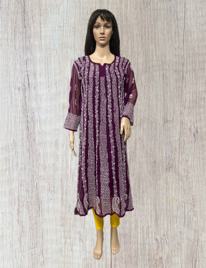 Green embroidered kurta on a mannequin against a gray background
