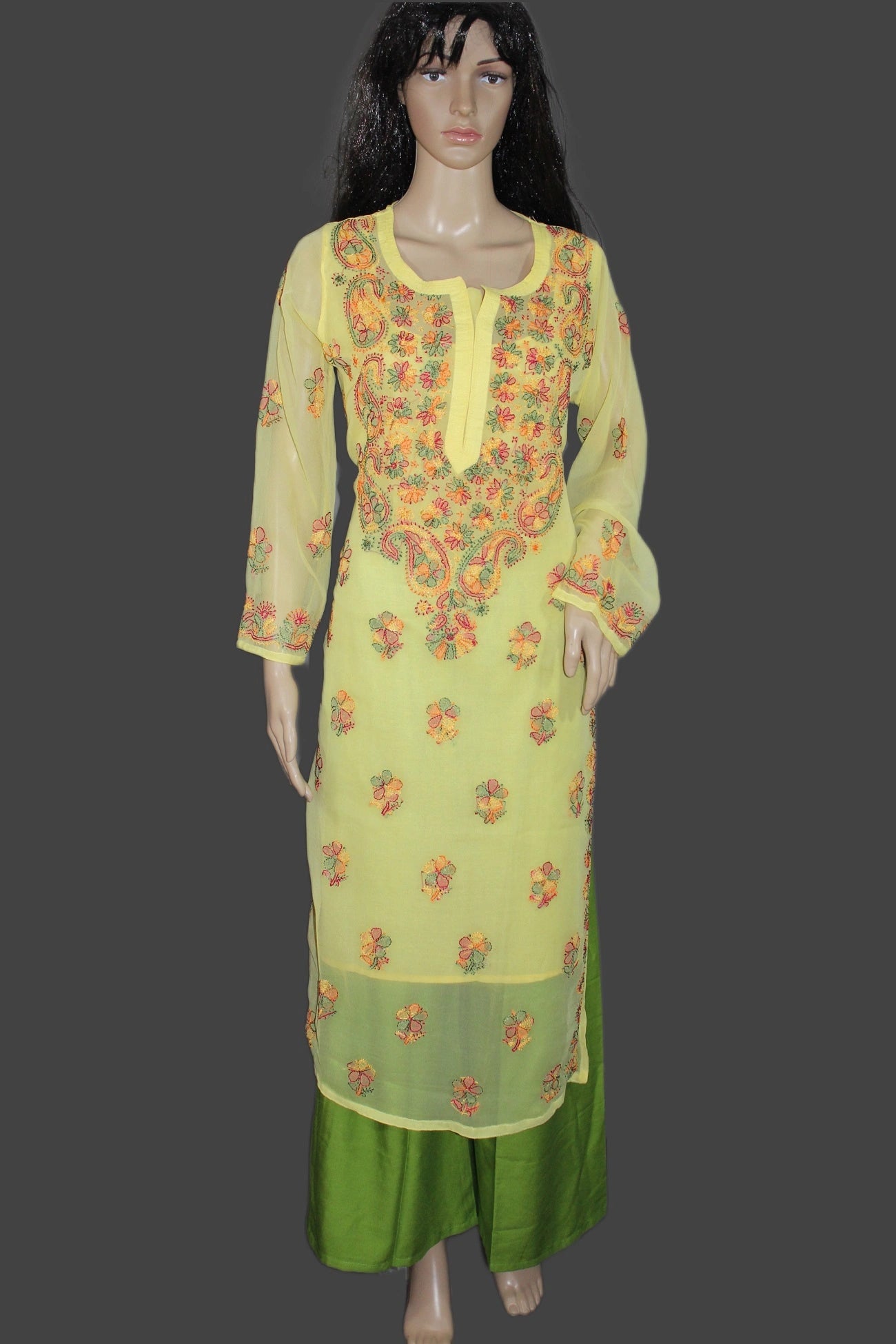 Light green embroidered kurta with green pants on a mannequin against a gray background