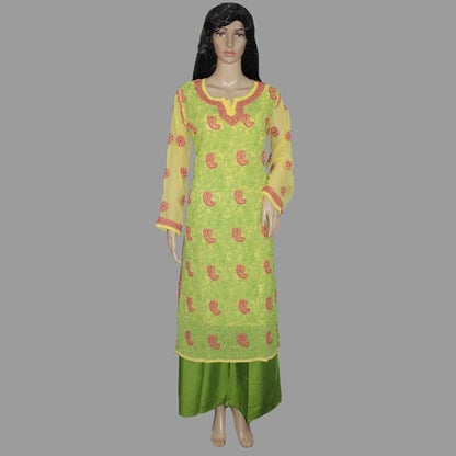 Green and yellow traditional outfit on a mannequin against a gray background