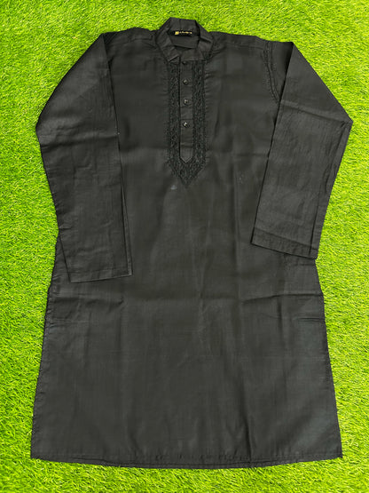 lucknowi chikankari Black long-sleeve shirt on a green grass-like background