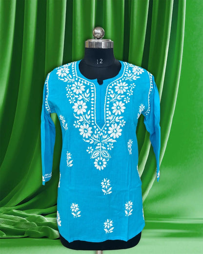 Mannequin wearing a lucknowi chikankari blue top.