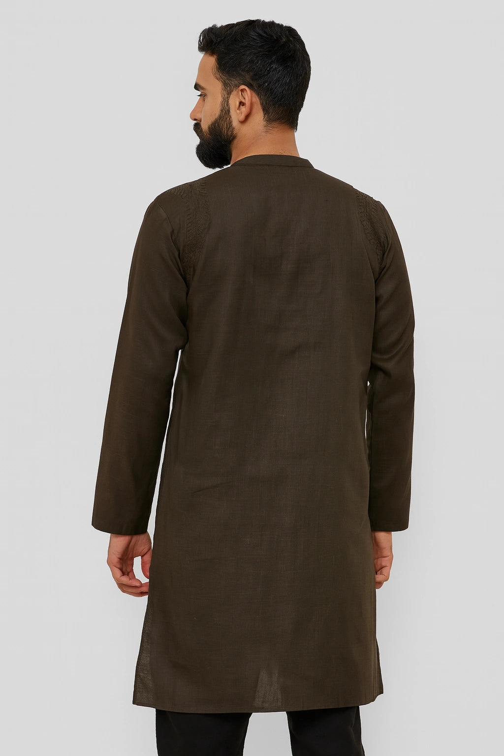 Man wearing a lucknowi chikankari brown long coat against a white background