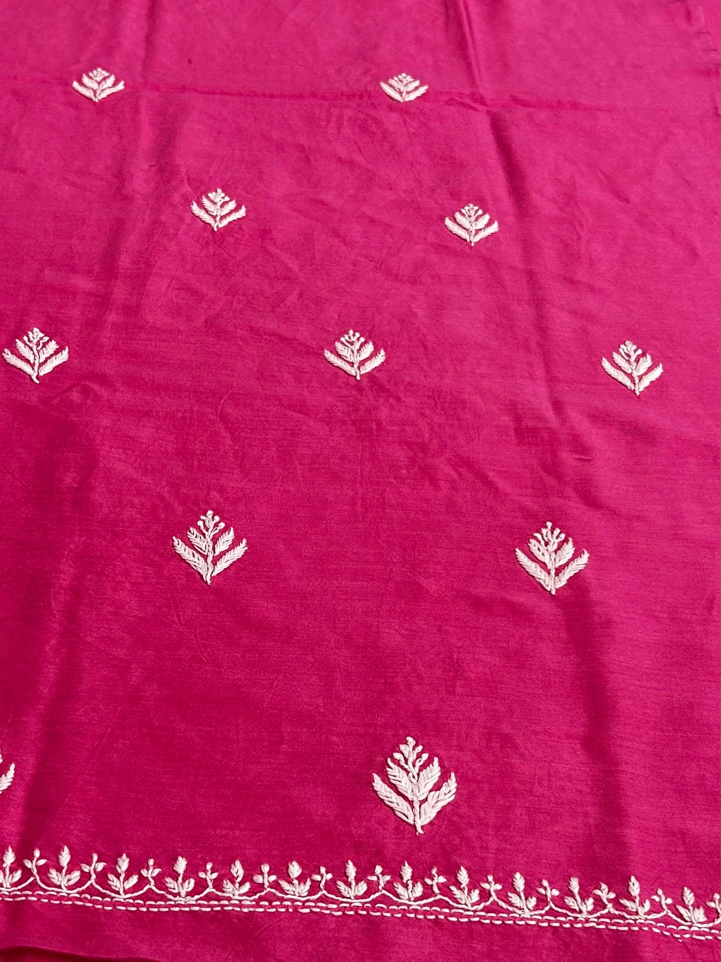 lucknowi chikankari Pink fabric with white floral patterns