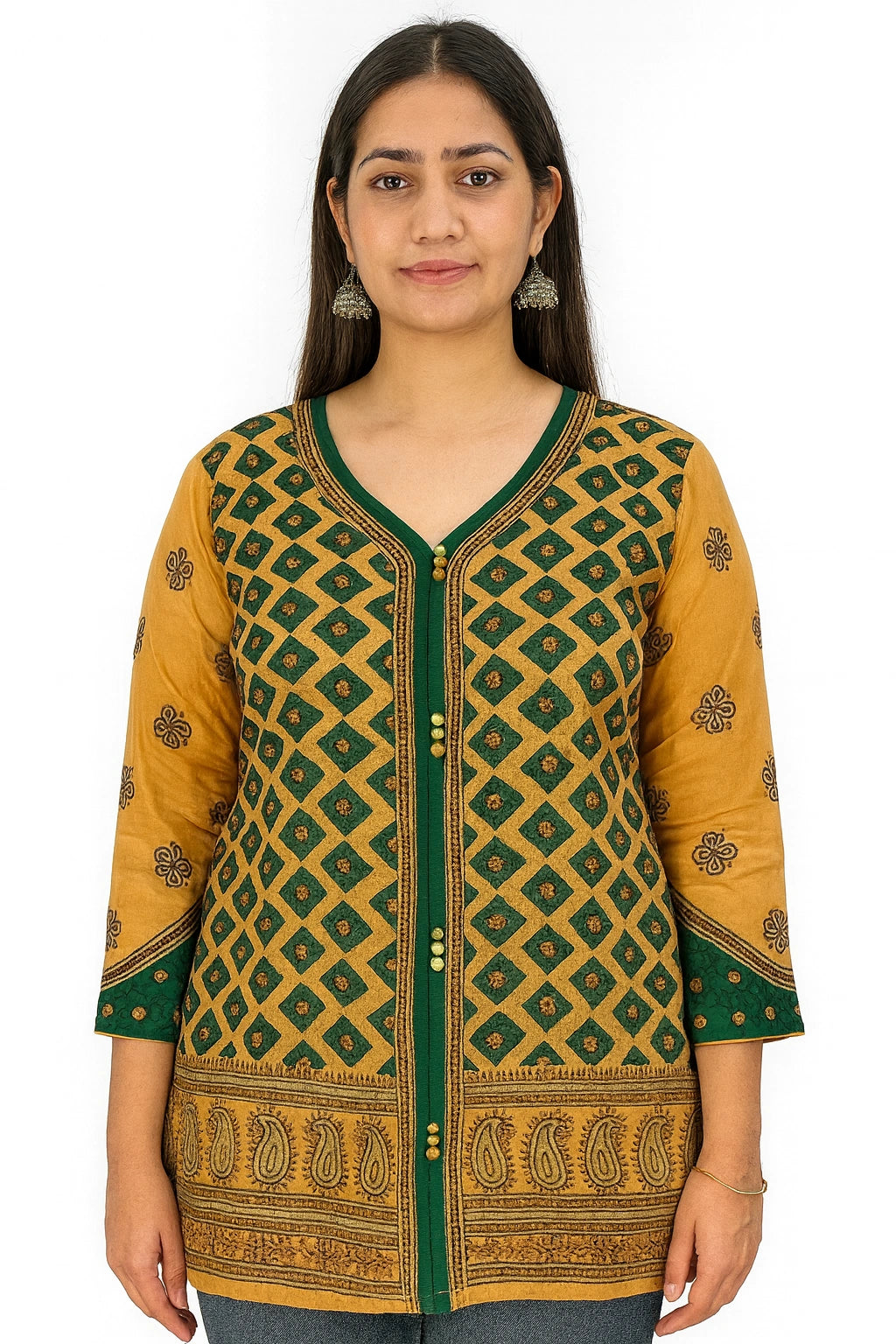 Woman wearing a lucknowi chikankari mustard yellow and green patterned top with a white background