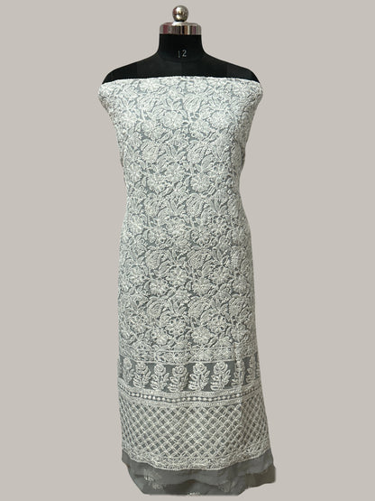 Lucknowi Chikankari White floral patterned dress on a mannequin against a gray background