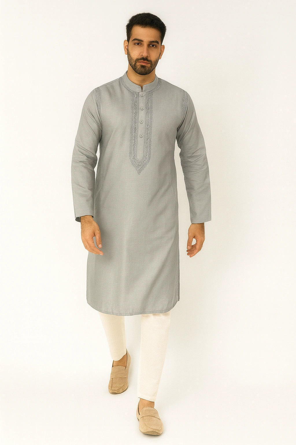 Man wearing a lucknowi chikankari  gray kurta with white pants on a white background