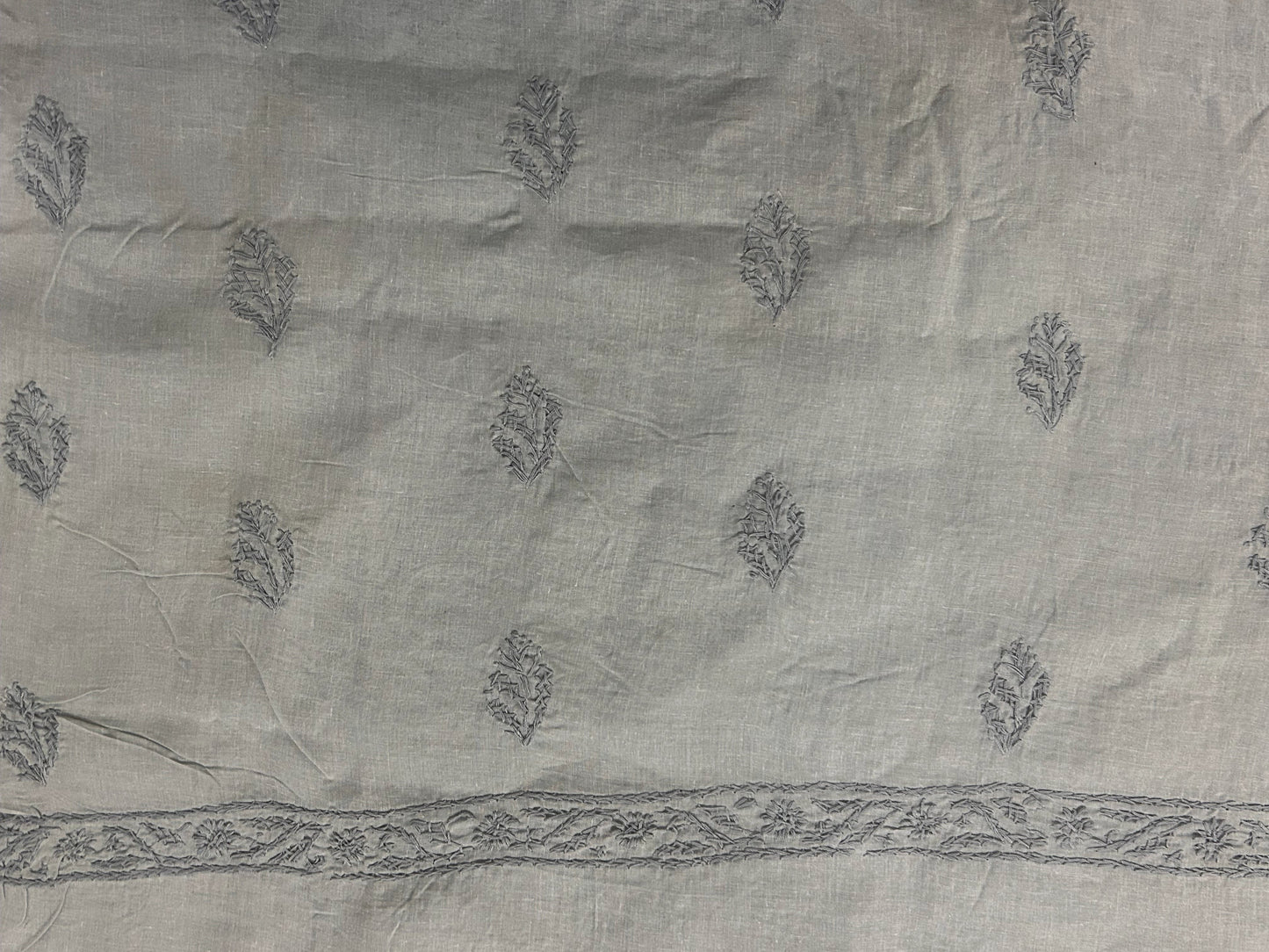 Gray fabric with subtle pattern and border