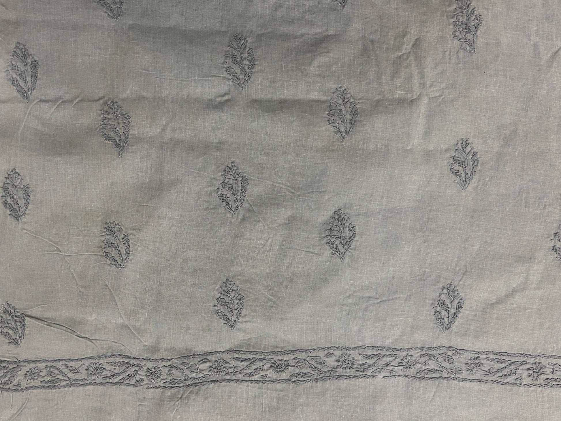 Gray fabric with subtle pattern and border
