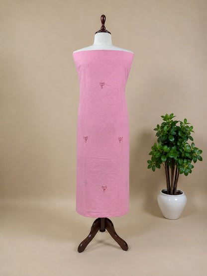 Lucknowi chikankari Mannequin wearing a pink towel with a plant on a beige background